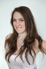 Fototapeta premium Woman with Brown Hair and Beautiful Blue Eyes