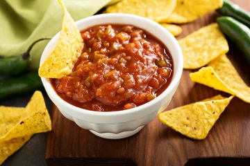 Fotobehang Red tomato spicy salsa with chips © fahrwasser