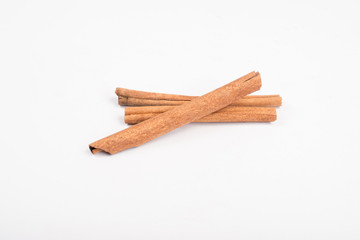 Cinnamon sticks isolated on white background.