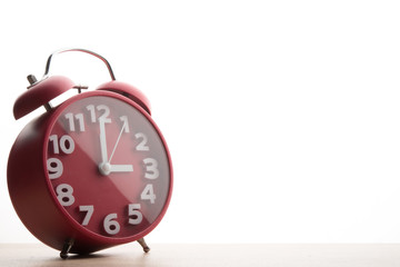 Red alarm clock isolated on white background. Business time.
