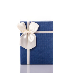 New color gift box with ribbon. Studio shot isolated on white