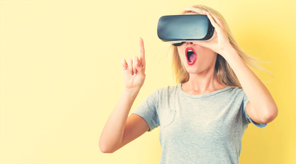 Young woman using a virtual reality headset