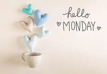 Hello Monday message with blue heart cushions