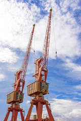 Old cranes loading and unloading ships on the dock of the port of Rio de Janeiro