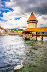 Obraz premium City center with famous Chapel Bridge and lake in Lucerne, Switzerland