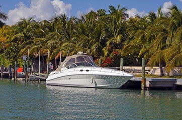 Cabin Cruiser moored at Sunset Island on Miami Beach,Florida
