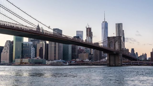 New York City and Manhattan Skyline Sunset from Brooklyn with the Brooklyn Bridge, Day to Night Timelapse Video