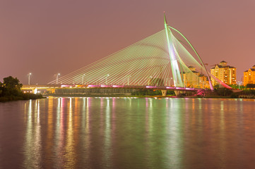 Fototapeta na wymiar Seri Wawasan Bridge the Rainbow Bridge in light green