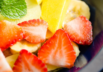 Clay bowl with fruit oatmeal