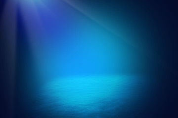 Deep blue sea background with sunlight shining 
