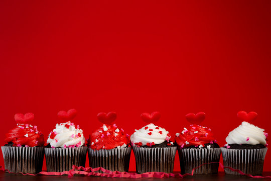 cupcakes set many for valentines on red close up hearts