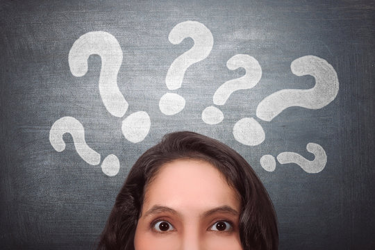 Thinking asian woman with question mark