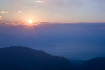 Sunrise mountains and mist.