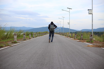 Obraz premium Man walking on road in Rayong, Thailand