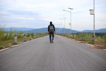 Obraz premium Man walking on road in Rayong, Thailand