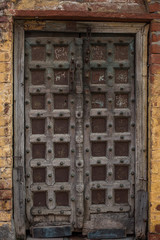 Ornate old wooden  door in Agra