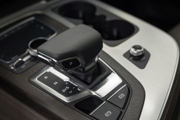 Fototapeta premium New business car automatic transmission. Interior detail.