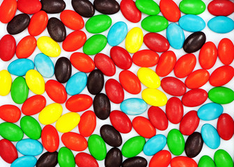 Multicolored candies for use as background. Closeup.