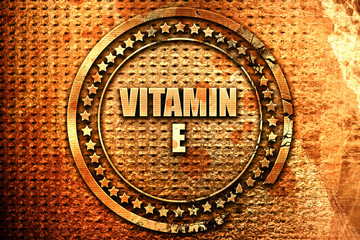vitamin e, 3D rendering, text on metal