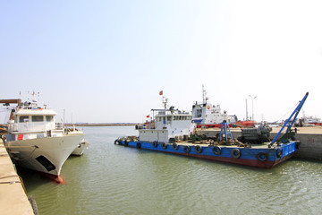 busy shipyard dock and docked ships