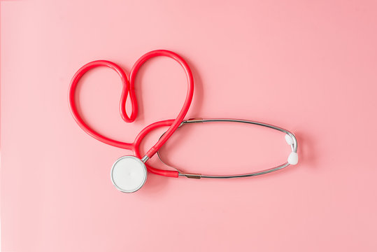 Red Stethoscope in Shape of Heart Isolated On