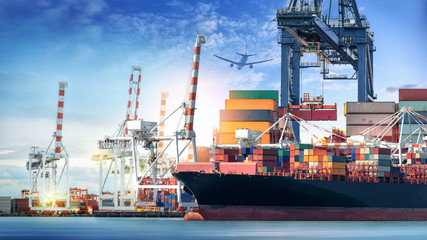 Obraz premium Logistics and transportation of International Container Cargo ship and cargo plane in the ocean at twilight sky, Freight Transportation, Shipping
