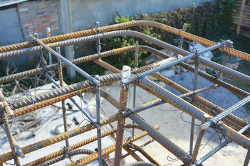 Metal rod construction. Iron Bar house corner building construction. Steel rebar, deformed steel...
