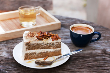 Coffee cake with almond and hot espresso