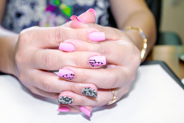 beautiful manicure -  hands Business lady on the desk