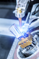 EDM machine handles aircraft engine turbine blade.