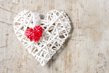 Small Red Wicker Heart on Big White Heart Copy Space