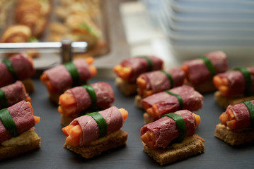 Delicious catering canapes on a buffet table.Close up.