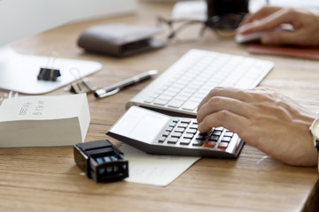 Man Hands Using Calculator Concept