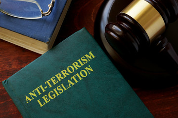 Anti-terrorism legislation title on a book and gavel.
