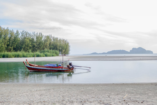traditional Thai long tail boat on the beach