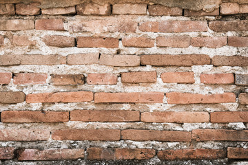 Old of concrete orange color blocks wall texture background.