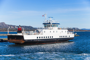 Fototapeta na wymiar Ro-Ro ferry ship goes on sea. Trondheim