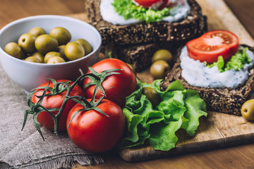 Healthy and Vegetarian diet breakfast concept. Tomatoes, Homemade bread 
