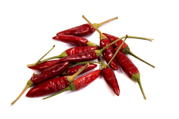 Dried red chili or chilli cayenne pepper isolated on white background cutout