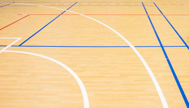 wooden floor volleyball, basketball, badminton court with light effect Wooden floor of sports hall with marking lines line on wooden floor indoor, gym court