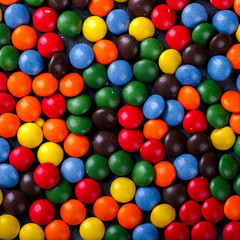 Fototapeta na wymiar Background of Bright Colored Candy top view. Copy space. selective focus.