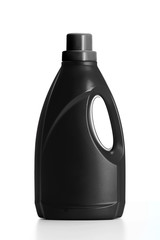 black plastic bottle with black  cap isolated on a white background for liquid laundry detergent or cleaning agent or bleach or fabric softener.
