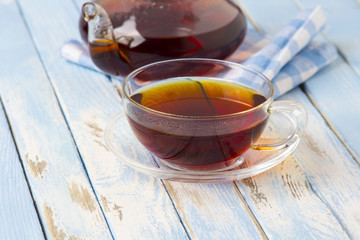 tea kettle cup vintage wood background