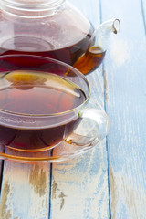 tea kettle cup vintage wood background
