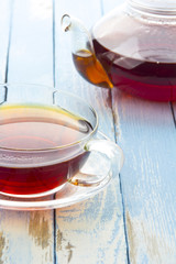 tea kettle cup vintage wood background
