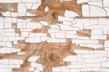 Peeling paint on wooden wall background