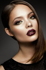 Beautyful girl with bright make up and beautiful hairstyle