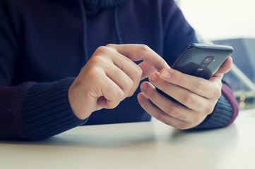 Young Man Using Smart Phone