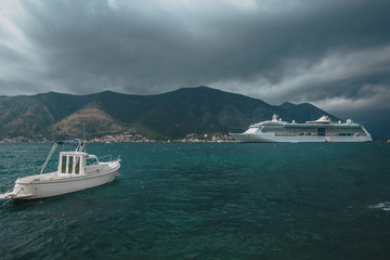 Fototapeta na wymiar Luxury cruise ship in Montenegro Kotor Bay.
