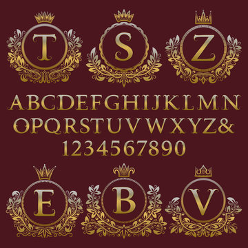 Vintage monogram kit. Golden letters, numbers and floral coat of arms frames for creating initial logo in antique style.